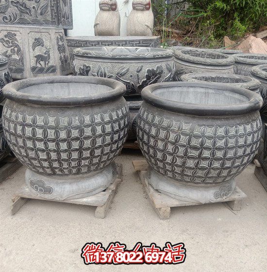 自然美學(xué)結(jié)合青石石雕、浮雕、編織、雕塑的戶外園林魚(yú)缸