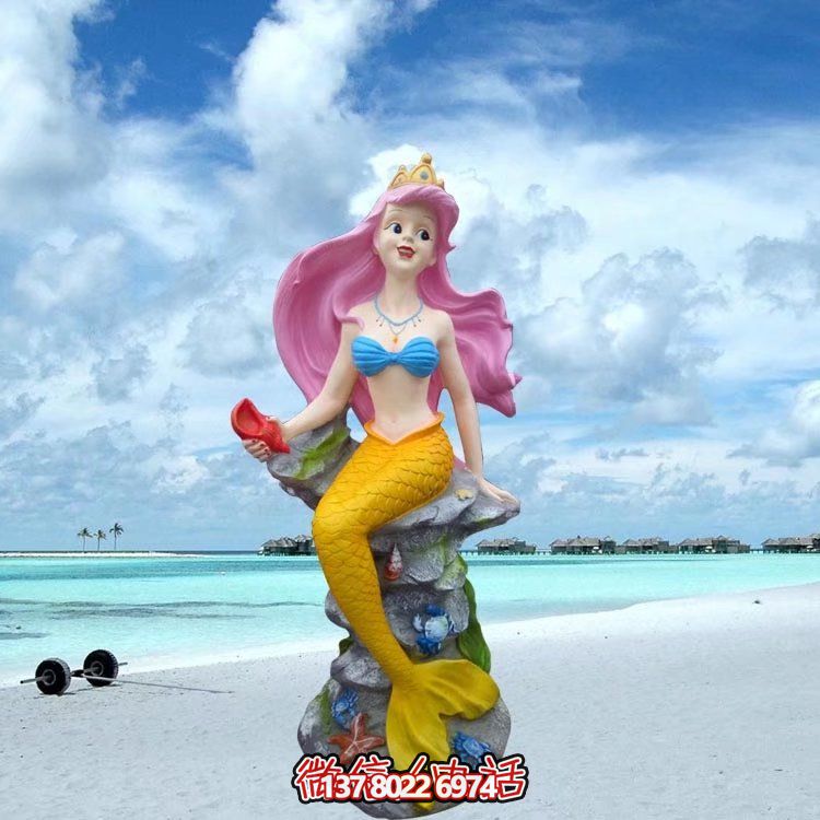 海邊公園擺放的紅頭發(fā)的玻璃鋼彩繪美人魚(yú)雕塑